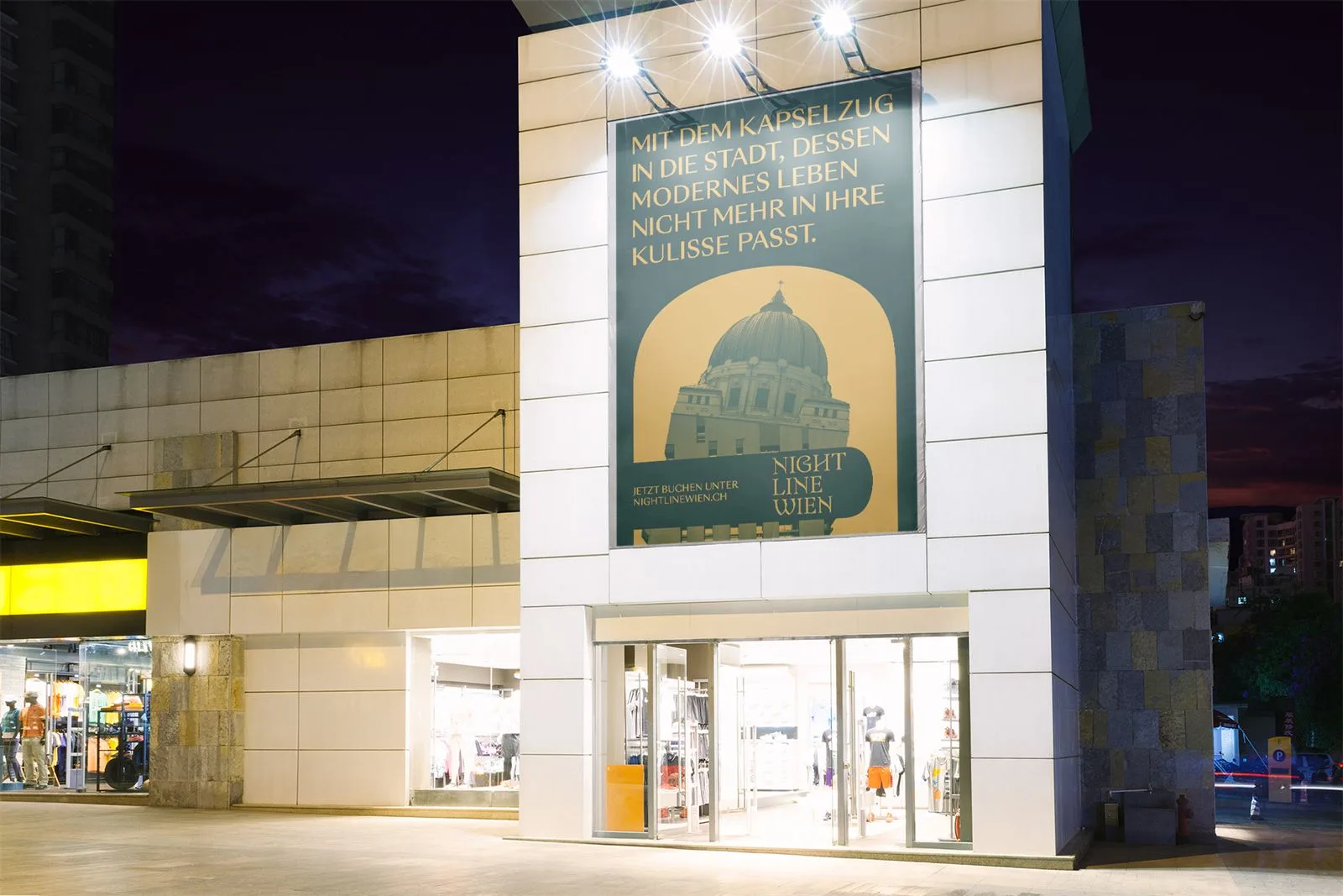 Plakat von Nightline Wien an einer Fassade bei Nacht